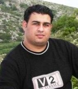علي محمد حسين الأسدي