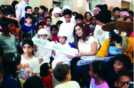 بلقيس تقرأ للصغار في مكتبة حديقة الباهية