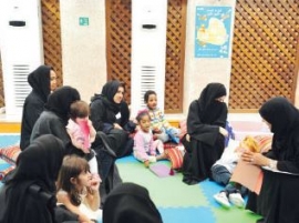 برنامج القراءة للأم والطفل